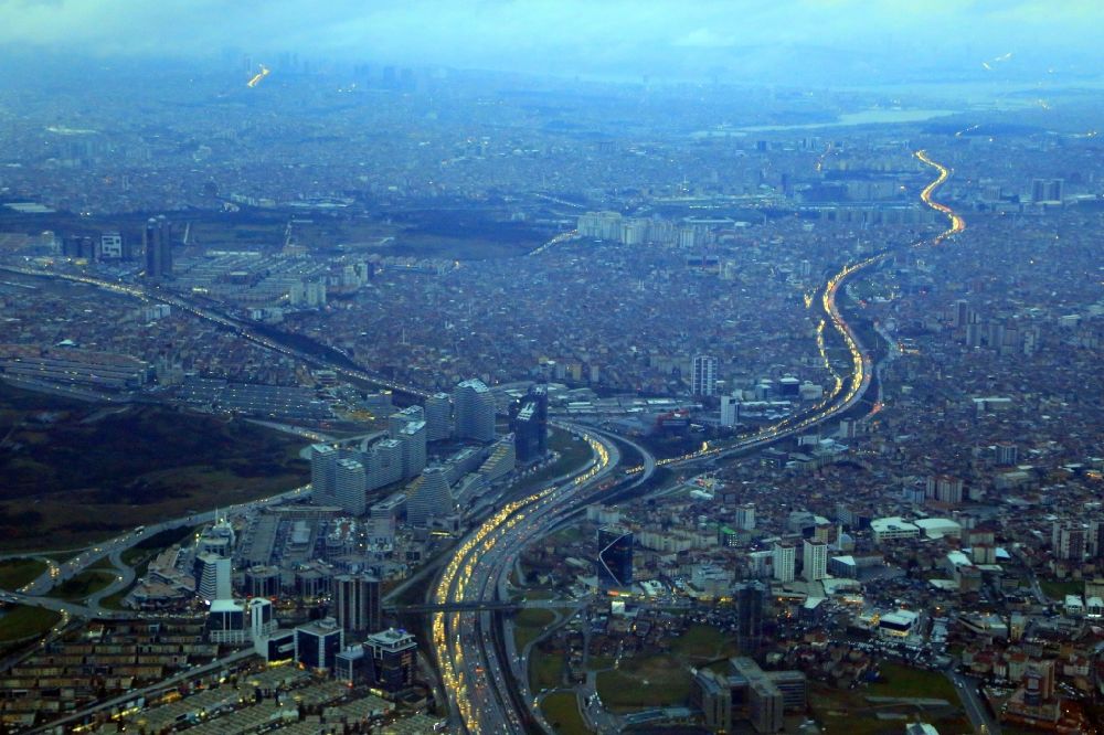 Aerial photograph Istanbul - Car lights on the lanes of the three-leg motorway- routes of the highways E80 / O3 in the morning traffic in Istanbul in Turkey