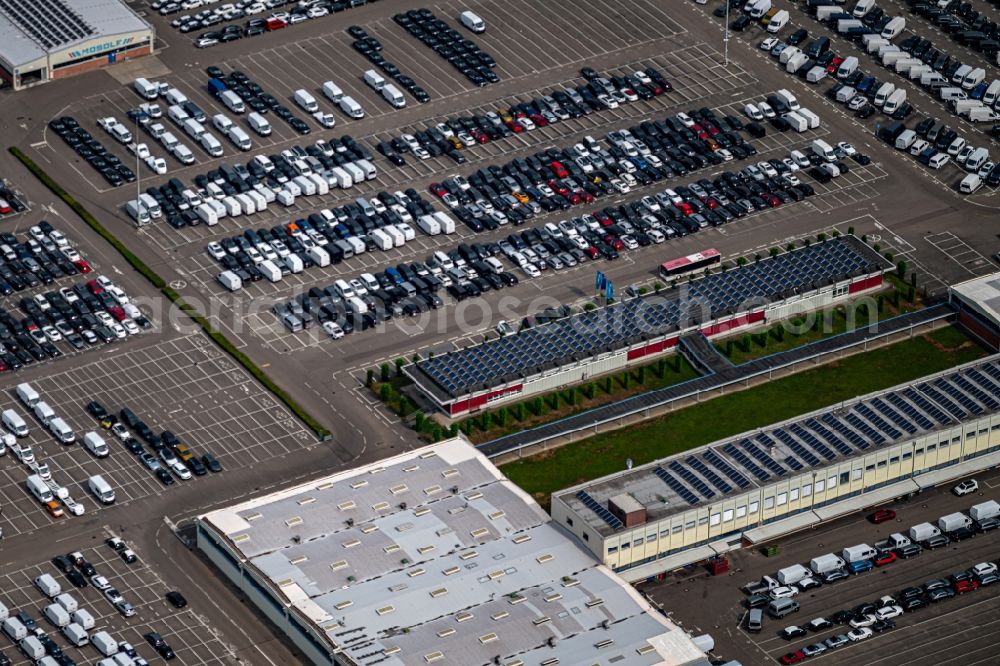 Kippenheim from the bird's eye view: Parking and storage space for automobiles of MOSOLF Logistics & Services GmbH on Freimatte in Kippenheim in the state Baden-Wurttemberg, Germany