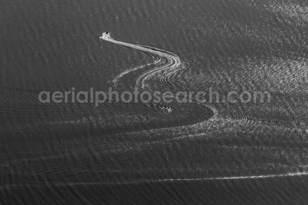 Aerial photograph Söby - Motorboat moving on the Baltic Sea in Soeby in Syddanmark, Denmark. Lanes with wave image of motor boat with water ski runners