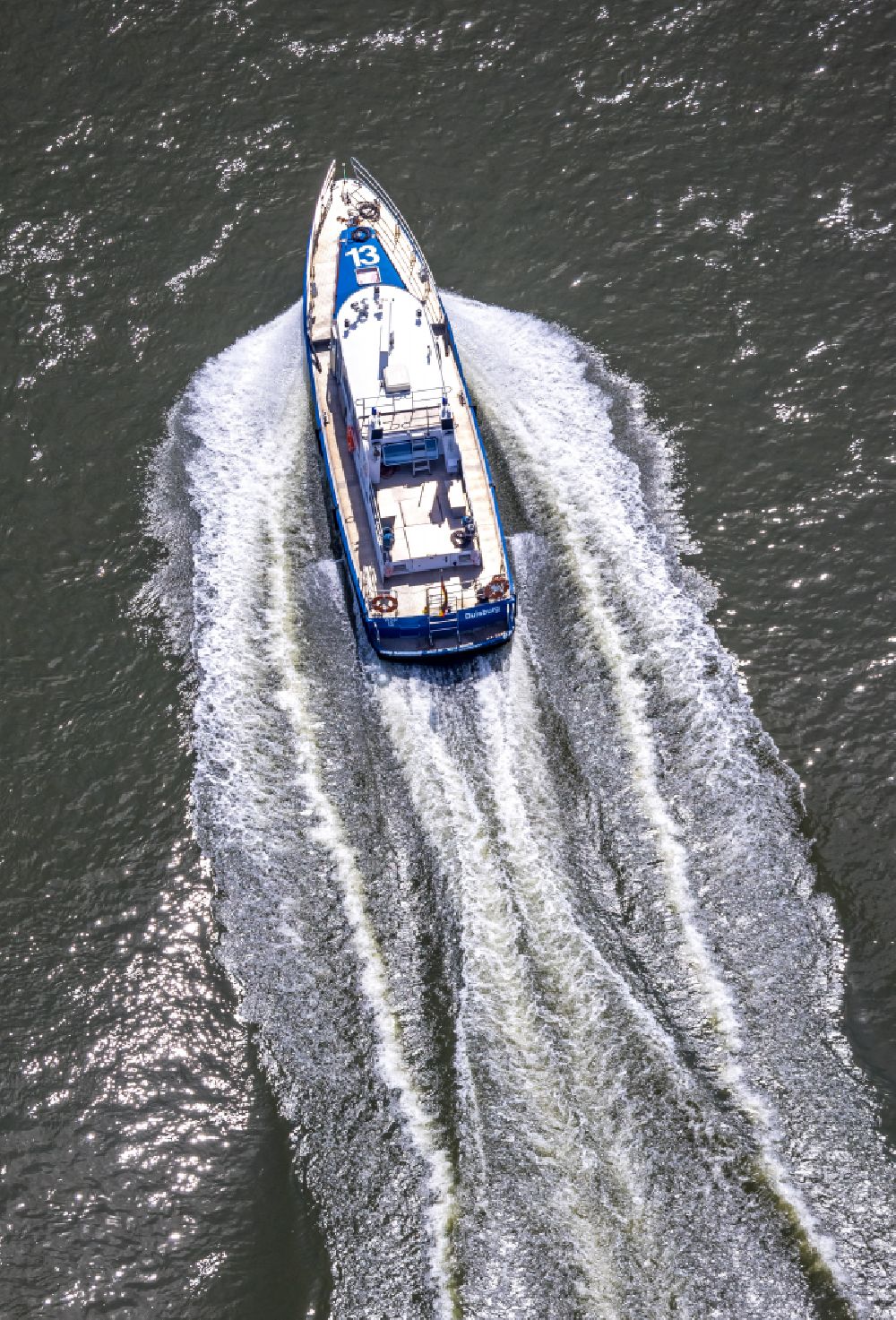 Duisburg from above - Motor boat of the water police, WSP 13, driving on the river Rhein in Duisburg in the Ruhr area in the state of North Rhine-Westphalia, Germany