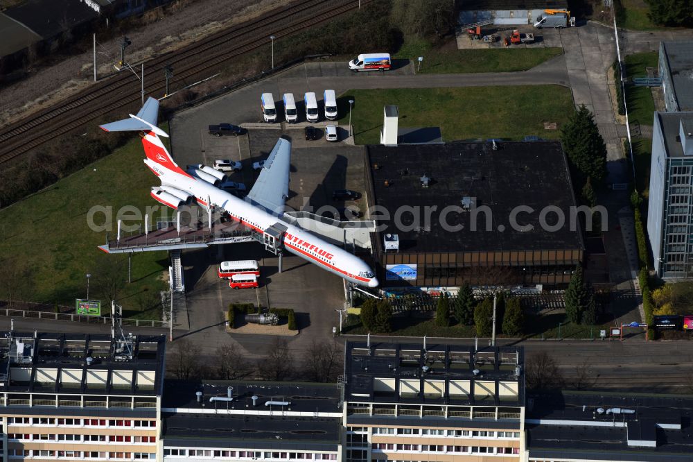 Aerial photograph Leipzig - Discarded Ilyushin IL-62 passenger aircraft of the former GDR - airline INTERFLUG as an aircraft with the registration DDR-SEF - used as a museum building ensemble and restaurant on Arno-Nitzsche-Strasse in the southern part of the city Leipzig in the state of Saxony, Germany
