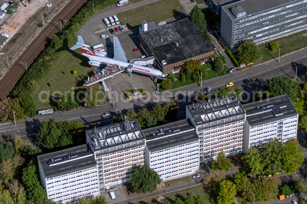 Aerial image Leipzig - Discarded Ilyushin IL-62 passenger aircraft of the former GDR - airline INTERFLUG as an aircraft with the registration DDR-SEF - used as a museum building ensemble and restaurant on Arno-Nitzsche-Strasse in the southern part of the city Leipzig in the state of Saxony, Germany