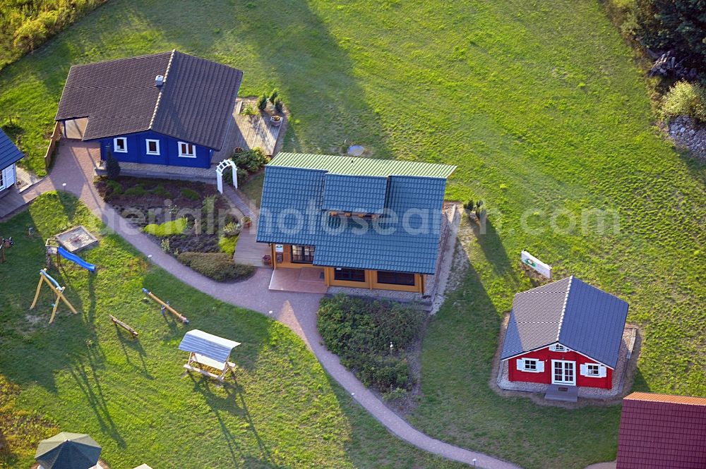 Aerial photograph Nahmitz - View onto the model house estate of the Holzindustrie Nahmitz GmbH in Nahmitz in the state Brandenburg. The Holzindustrie Nahmitz GmbH is specialised in block houses
