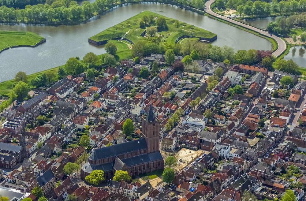 Naarden from the bird's eye view: Partial view of the fortress city Naarden with view of the church St. Vituskirche and the outer fastening ring in North Holland in the Netherlands