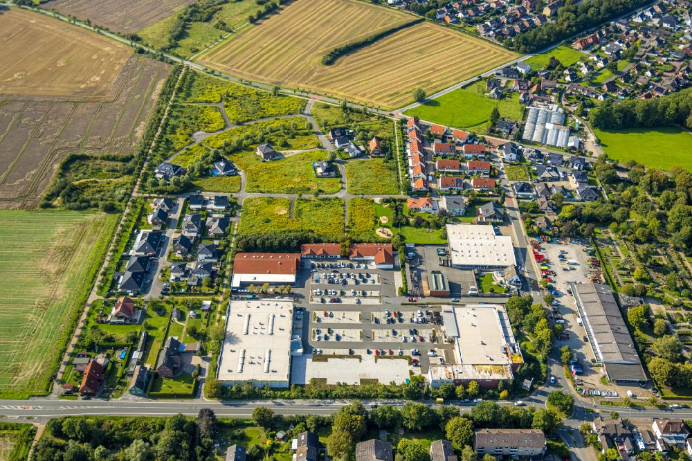 Aerial image Beckum - Building complex of local supply center Rewe and Aldi on street Cheruskerstrasse in Beckum at Sauerland in the state North Rhine-Westphalia, Germany