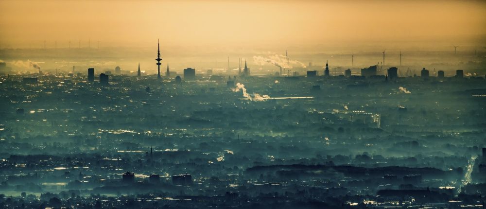 Hamburg from the bird's eye view: Weather related fog banks and cloud layer ueber of skyline ( Panorama) in Hamburg, Germany