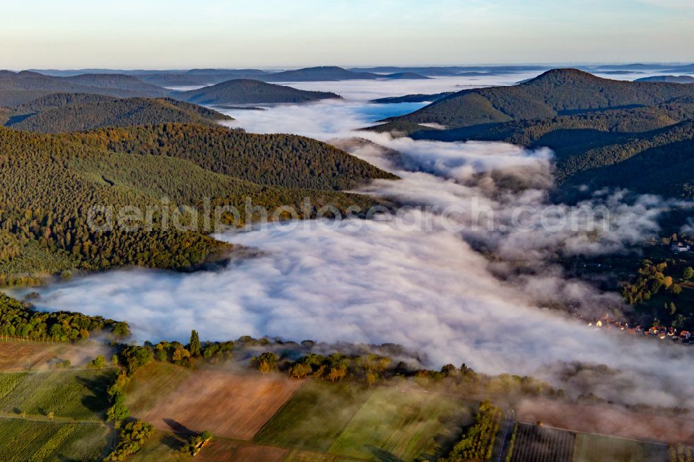 Bobenthal from the bird's eye view: Weather related fog banks and cloud layer over forest areas and mountain ranges on street Sankt Germanshof in Bobenthal in the Palatinate Forest in the state Rhineland-Palatinate, Germany