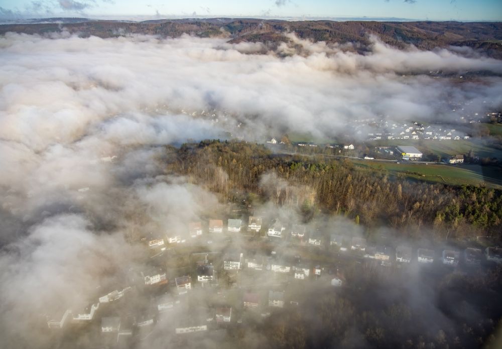 Aerial image Arnsberg - Weather related fog banks and cloud layer in the residential area Am Fichtenhang in the district Rumbeck in Arnsberg at Ruhrgebiet in the state North Rhine-Westphalia, Germany
