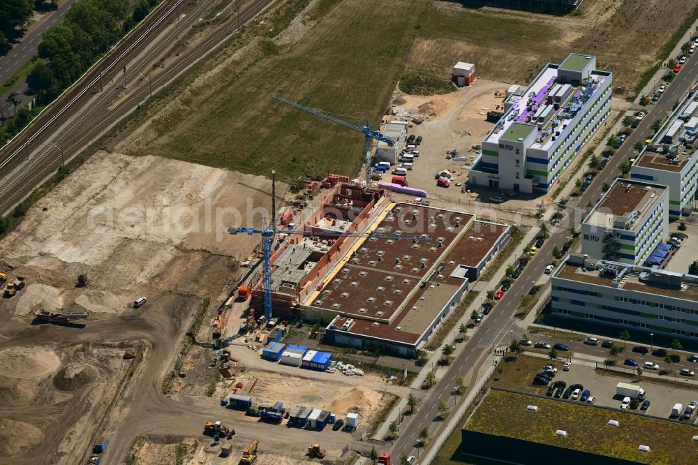 Aerial photograph Berlin - Construction site of the function and archive building UB-Magazin - Speicherbibliothek and Universitaetsarchiv on Wagner-Regeny-Strasse in the district Adlershof in Berlin, Germany