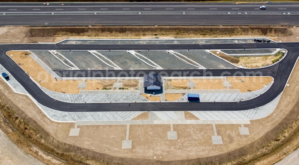 Rötha from above - New construction site of the motorway service station and parking spaces along the route and lanes in the course of the tank and rest area of the BAB A 72 in the district Gaulis in Roetha in the state Saxony, Germany