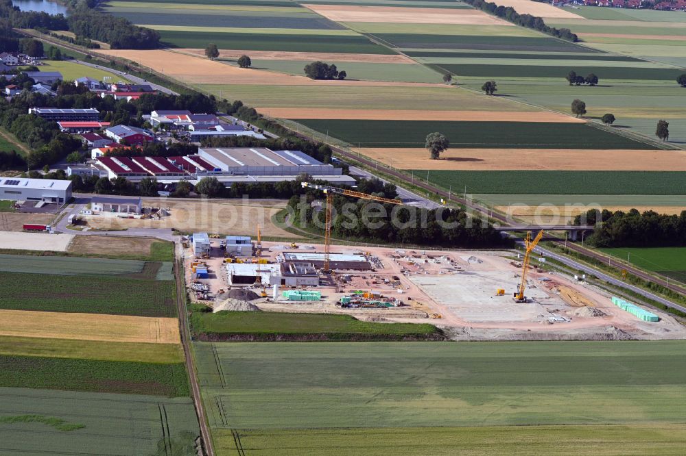 Ebenhausen from the bird's eye view: New building construction site in the industrial park Gewerbegebiet Brautlach III on street B13 in Ebenhausen in the state Bavaria, Germany
