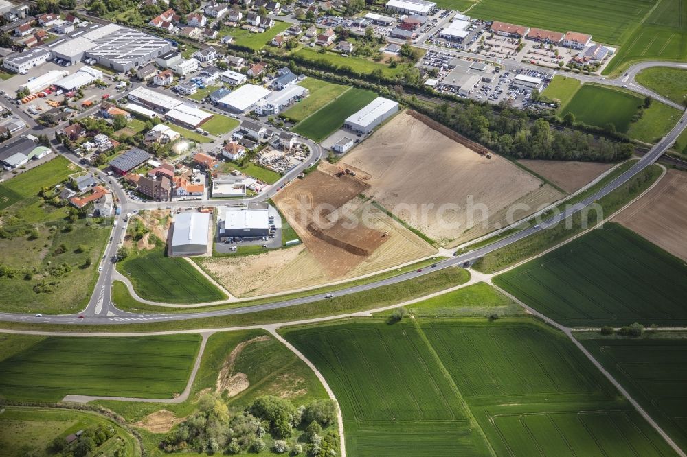Nidderau from the bird's eye view: New building construction site in the industrial park Am Lindenbaeumchen between Philipp-Reis-Strasse and Siemensstrasse in the district Heldenbergen in Nidderau in the state Hesse, Germany