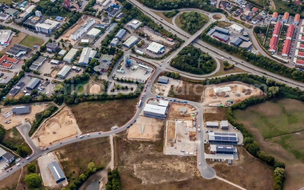 Aerial photograph Schönkirchen - New construction site in the commercial area along the street Pahlbloken on the federal highway B502 in Schoenkirchen in the state Schleswig-Holstein, Germany