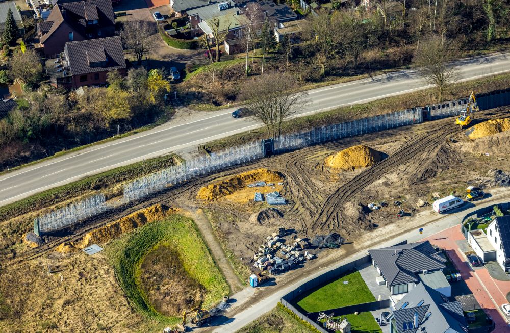 Aerial image Kirchhellen - Construction site for the new construction of a noise protection wall on Rentforter Strasse in Kirchhellen in the Ruhr area in the state of North Rhine-Westphalia, Germany