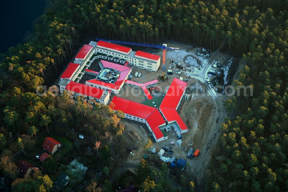 Strausberg from the bird's eye view: New construction site for a rehabilitation center of the rehabilitation clinic on Umgehungsstrasse - Amselweg in Strausberg in the state Brandenburg, Germany