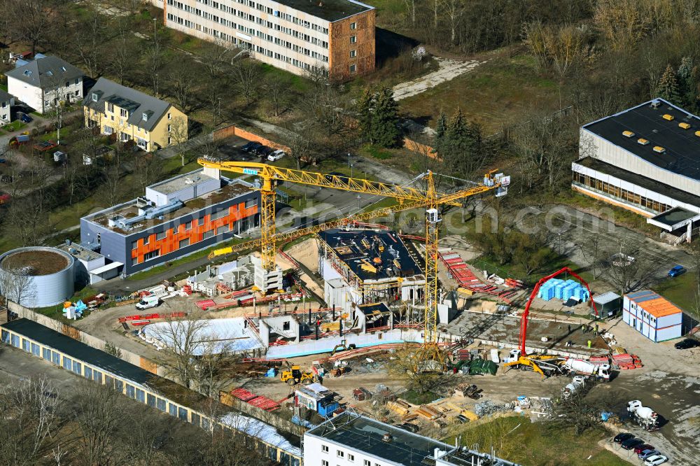 Aerial photograph Berlin - New construction site of the administration building and situation center for the radiological emergency response of the state authority BfS Federal Office for Radiation Protection on the street Koepenicker Allee in the district Karlshorst in Berlin, Germany