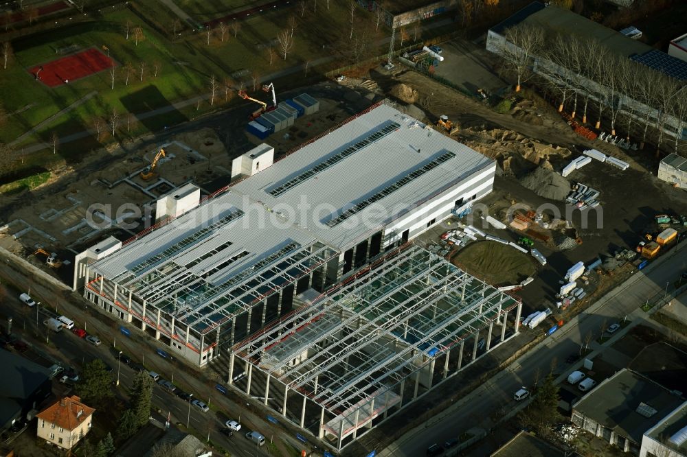 Berlin from the bird's eye view: New building - construction site on the factory premises of Jonas & Redmann Group GmbH on Segelfliegerdonm in the district Johannisthal in Berlin, Germany