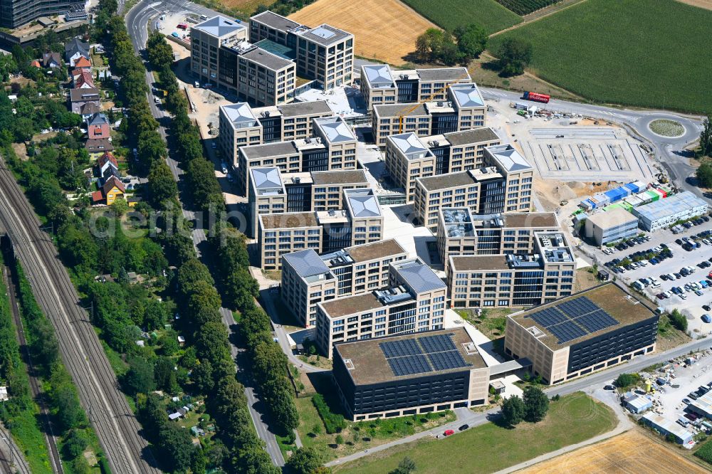 Aerial photograph Kornwestheim - New building - construction site on the factory premises of the Wuestenrot campus of the Wuestenrot & Wuerttembergische AG on Ludwigsburger Strasse - Hohenzollernstrasse in Kornwestheim in the state Baden-Wuerttemberg, Germany