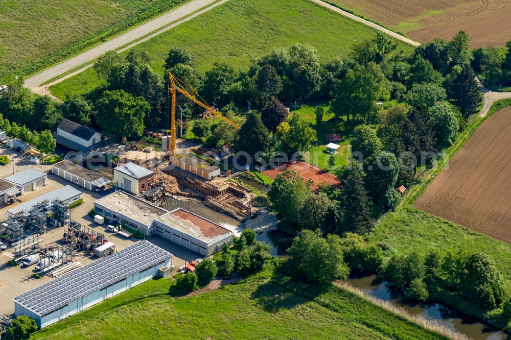 Rheinhausen from the bird's eye view: Construction site of the depot of the Netze BW GmbH, Regionalzentrum Rheinhausen in Rheinhausen in the state Baden-Wuerttemberg, Germany