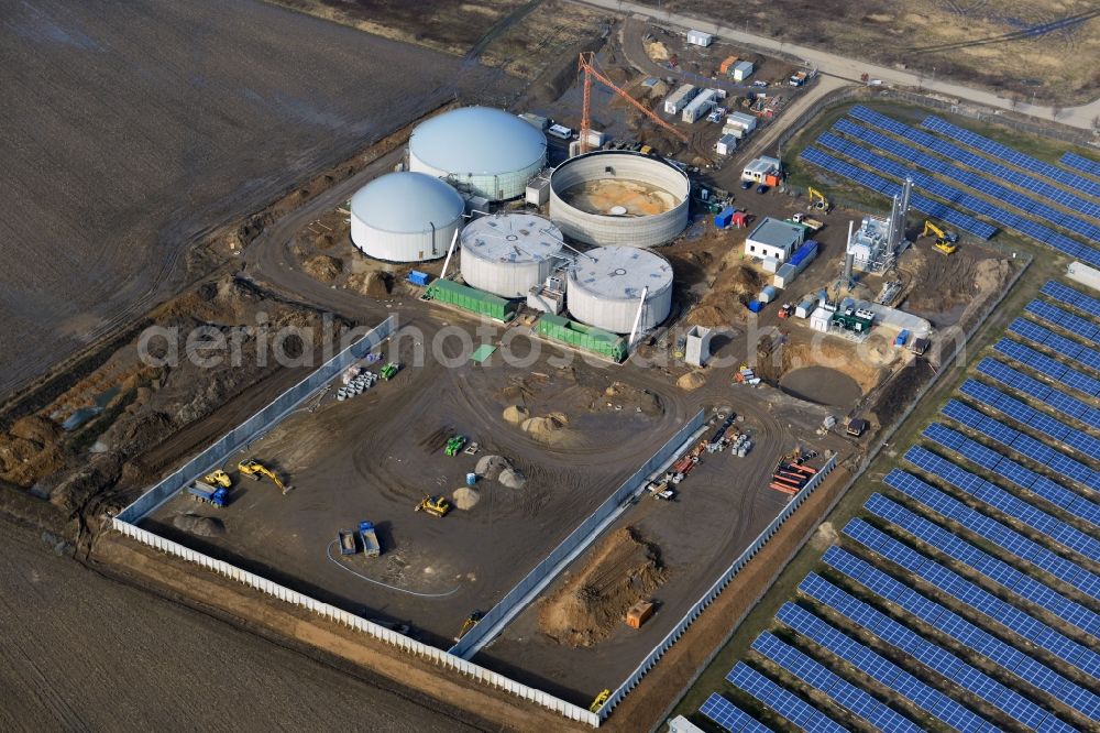 Oberkrämer from above - Construction of a biogas - plant on solar park in Oberkrämer in Brandenburg. The solar energy and photovoltaic location for renewable energy provides 36% of EEG power