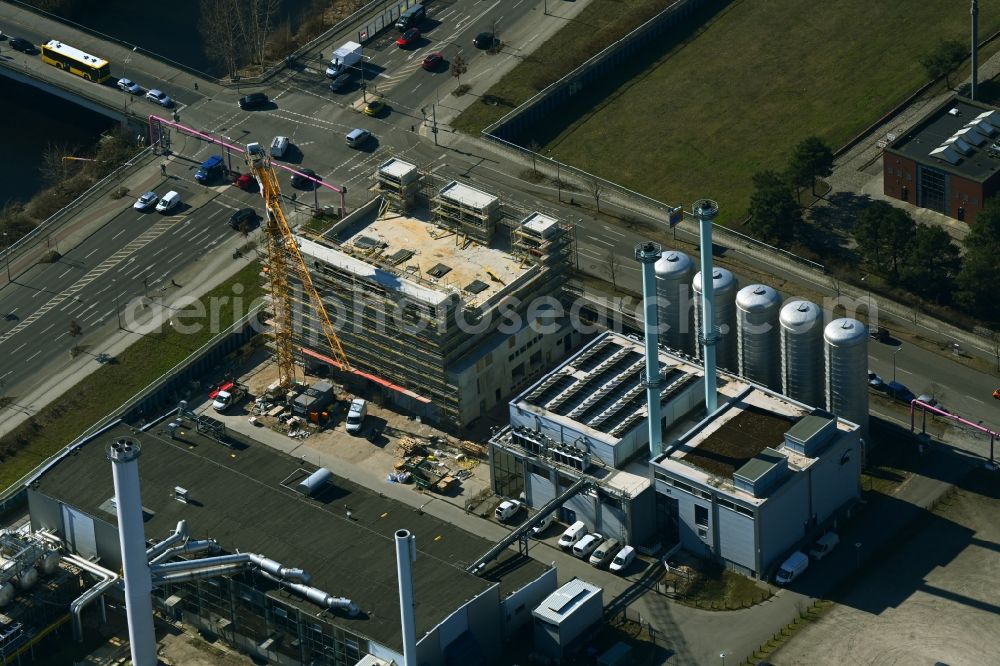 Berlin from above - Construction site of power plants and exhaust towers of thermal power station of the regional heating plant of BTB Blockheizkraftwerks-Traeger- and Betreibergesellschaft mbH on Wegedornstrasse - Ernst-Ruska-Ufer in the district Adlershof in Berlin, Germany