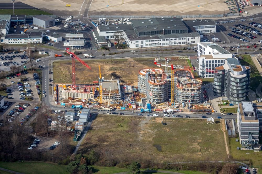 Aerial photograph Düsseldorf - Construction site to build a new office and commercial building AOS on Klaus-Bungert-Strasse in the district Lohausen in Duesseldorf in the state North Rhine-Westphalia, Germany