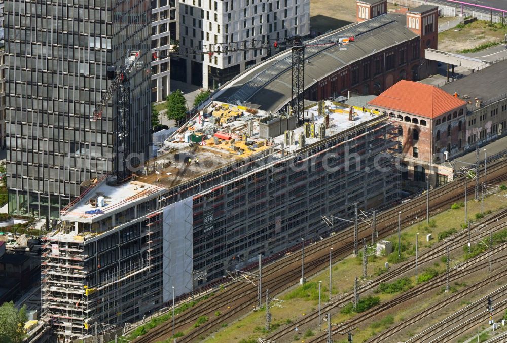 Aerial image Berlin - Construction site to build a new office and commercial building on street Am Postbahnhof in the district Friedrichshain in Berlin, Germany