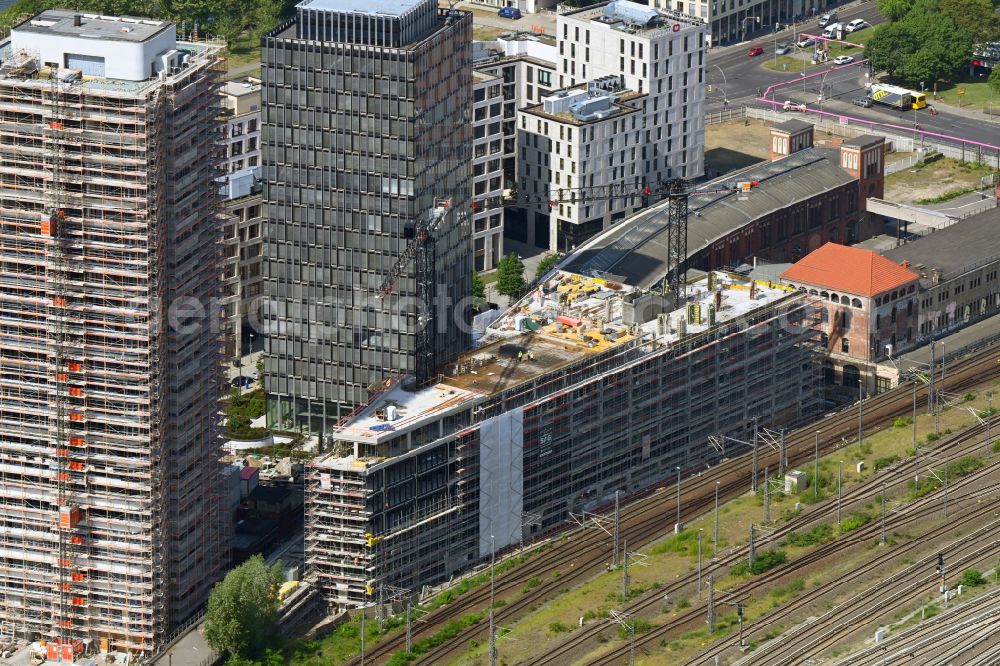 Aerial photograph Berlin - Construction site to build a new office and commercial building on street Am Postbahnhof in the district Friedrichshain in Berlin, Germany