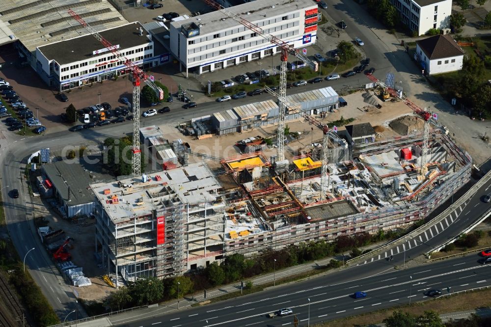 Wolfsburg from the bird's eye view: Construction site to build a new office and commercial building Berliner Haus in the district Hesslingen in Wolfsburg in the state Lower Saxony, Germany