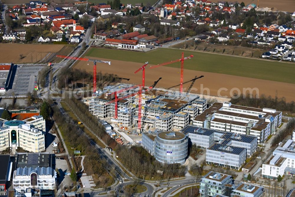 Aschheim from the bird's eye view: Construction site to build a new office and commercial building Campus One on Erdinger Landstrasse - Einsteinring in the district Dornach in Aschheim in the state Bavaria, Germany