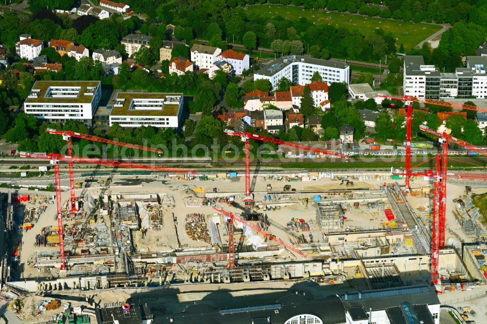 Jena from above - Construction site for the new construction of an office and commercial building for the new company headquarters for the Medical Technology and Research Microscopy Solutions division of Carl Zeiss Meditec AG and Carl Zeiss AG on street Otto-Schott-Strasse in Jena in the state of Thuringia, Germany