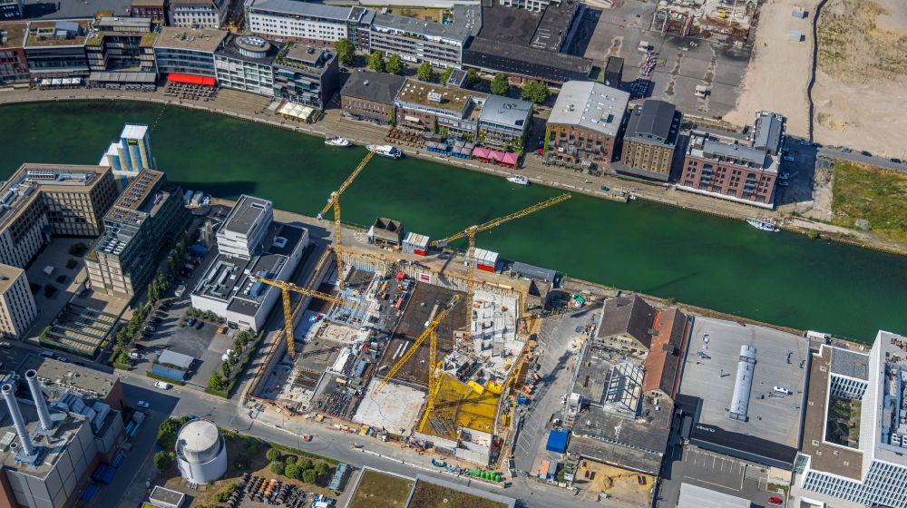 Münster from above - Construction site to build a new office and commercial building Dock14 on street Am Mittelhafen in the district Ost in Muenster in the state North Rhine-Westphalia, Germany