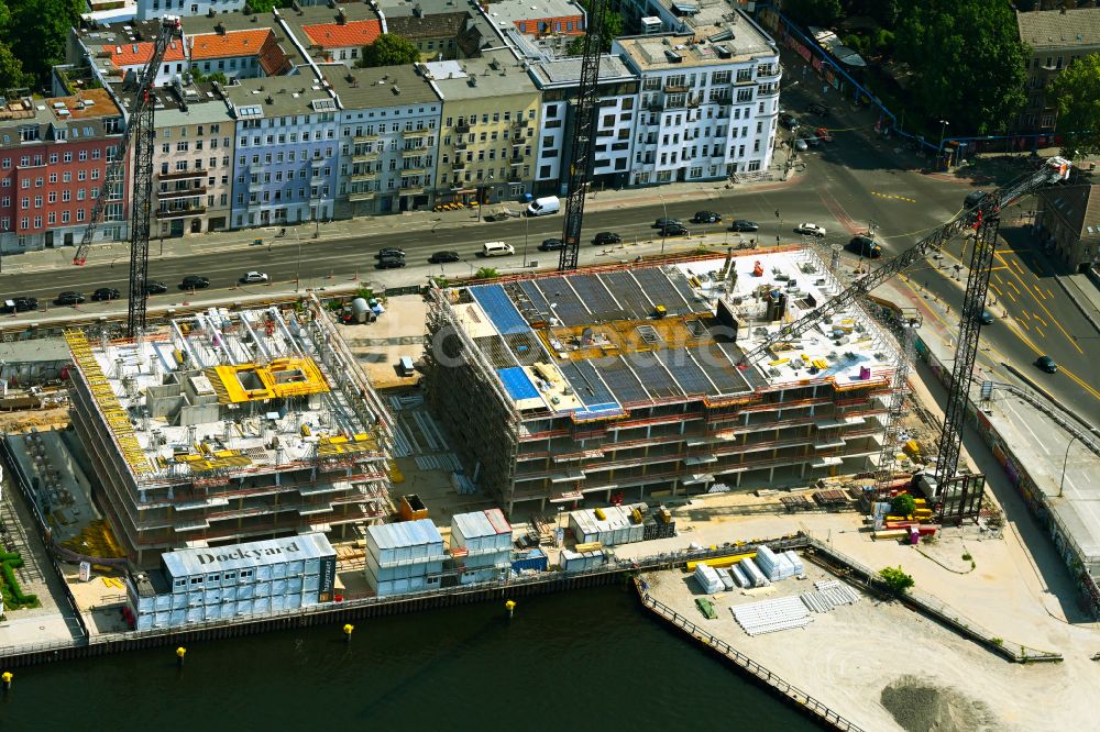 Berlin from above - Construction site to build a new office and commercial building Dockyard Waterfront Offices of East-Port-Area GmbH on street Stralauer Allee in the district Friedrichshain in Berlin, Germany