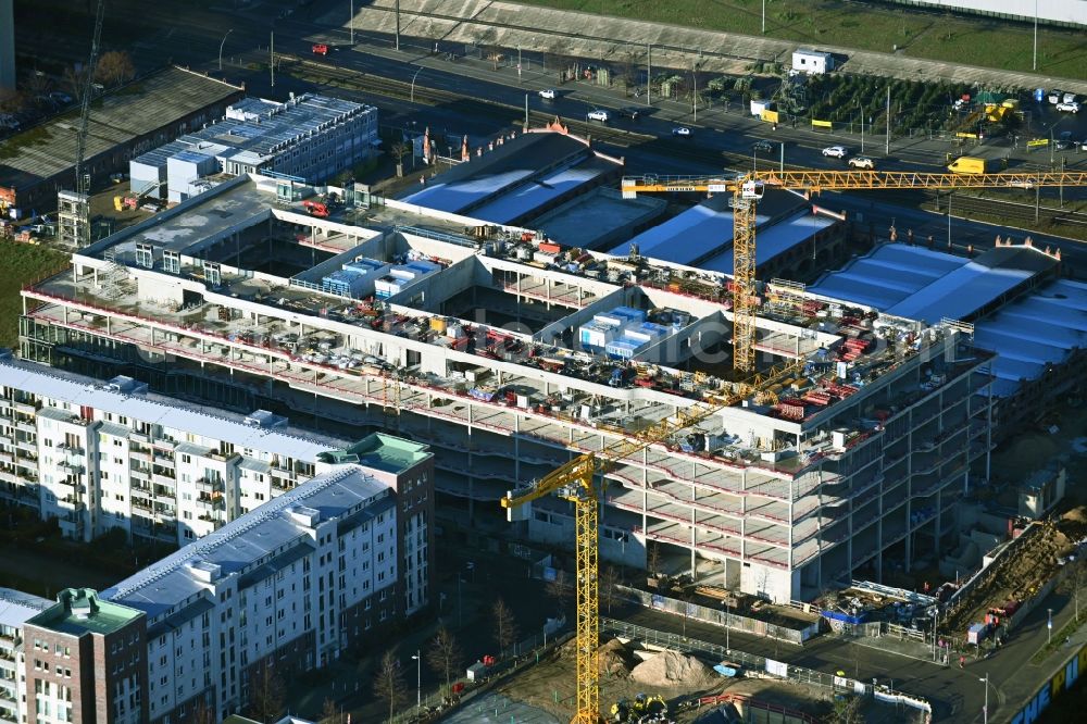 Berlin from the bird's eye view: Construction site to build a new office and commercial building DSTRCT.Berlin on Landsberger Allee, Otto-Ostrowski-Strasse and Hermann-Blankenstein-Strasse in the district Prenzlauer Berg in Berlin, Germany