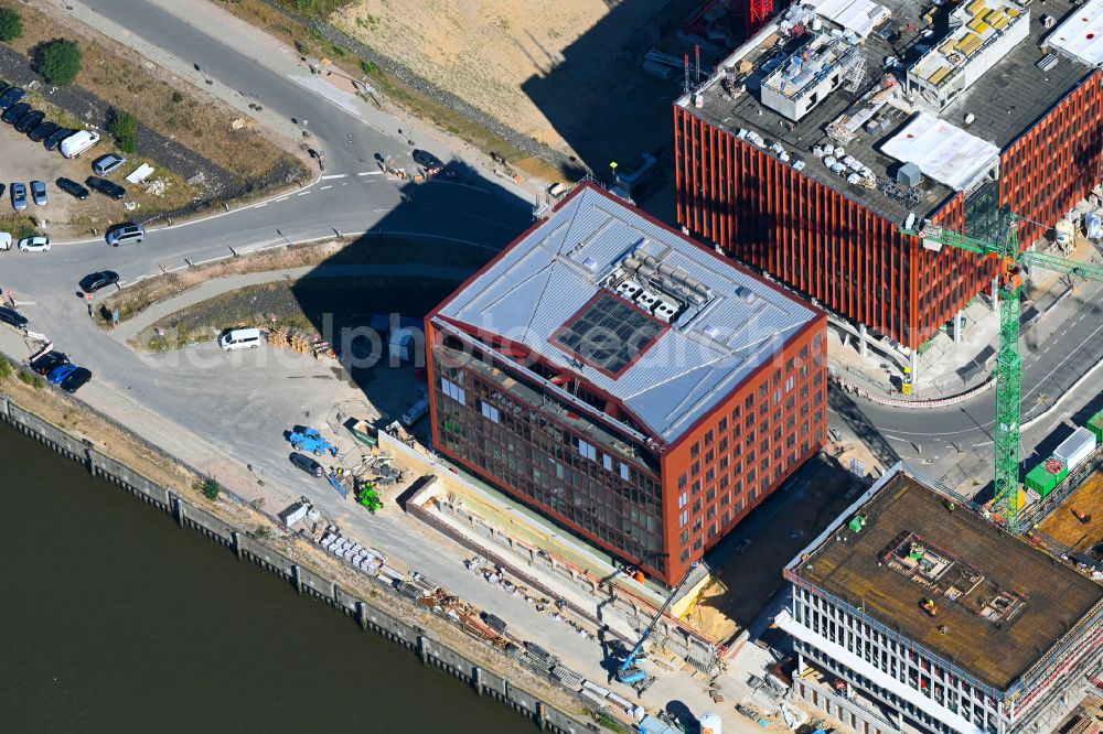 Hamburg from the bird's eye view: Construction site to build a new office and commercial building EDGE ElbSide on place Amerigo-Vespucci-Platz in the district HafenCity in Hamburg, Germany
