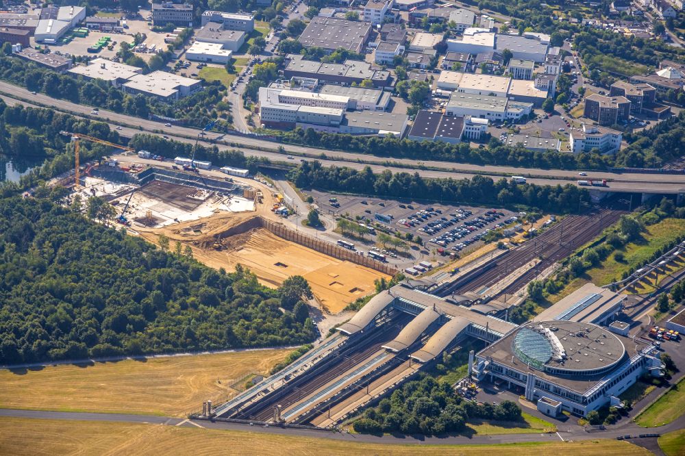 Düsseldorf from above - Construction site for a new office and commercial building EUREF-Campus, an innovative office location directly at Dusseldorf airport train station in the Lohausen district of Dusseldorf in the Ruhr area in the state of North Rhine-Westphalia, Germany