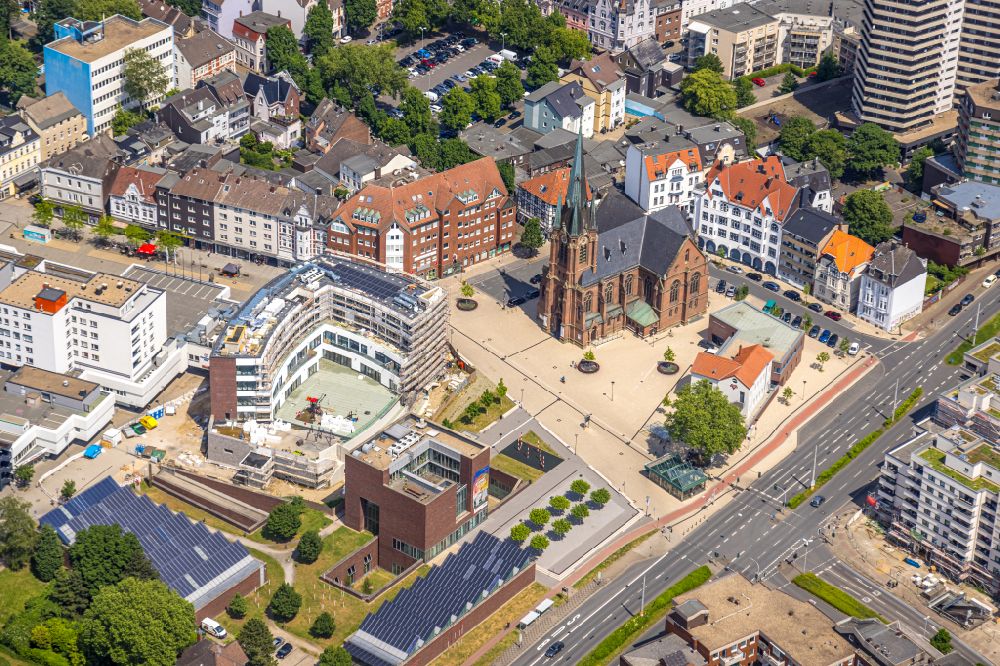 Aerial photograph Herne - Construction site for the new construction of an office and commercial building Europagarten overlooking the church Kreuzkirche at Europaplatz in Herne at Ruhrgebiet in the state North Rhine-Westphalia, Germany