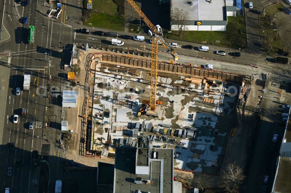 Berlin from the bird's eye view: Construction site to build a new office and commercial building on Frankfurter Allee corner Buchberger Strasse in the district Lichtenberg in Berlin, Germany