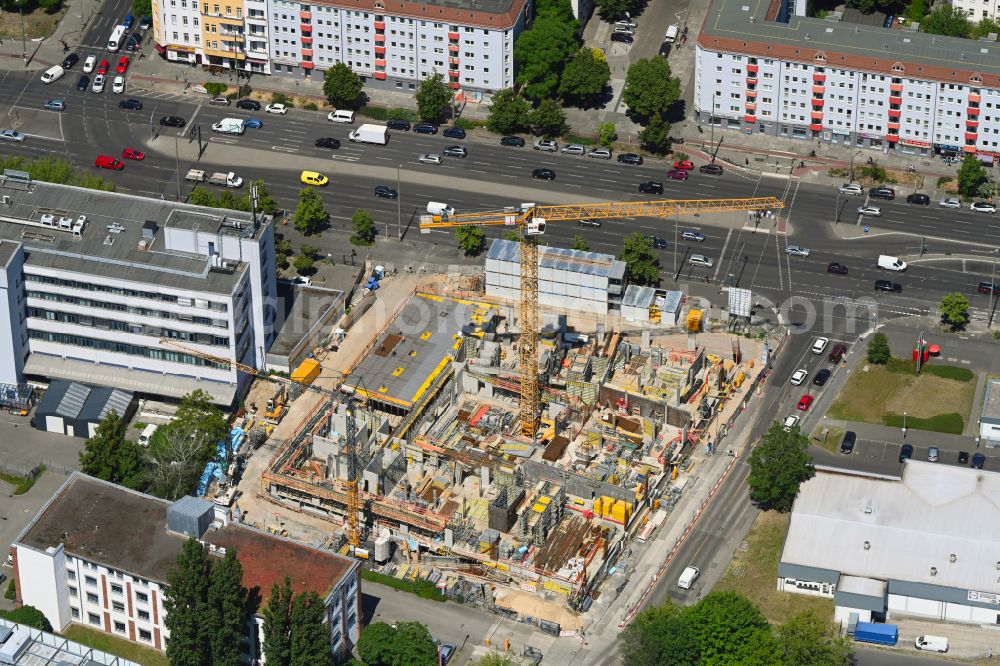Berlin from the bird's eye view: Construction site to build a new office and commercial building on Frankfurter Allee corner Buchberger Strasse in the district Lichtenberg in Berlin, Germany