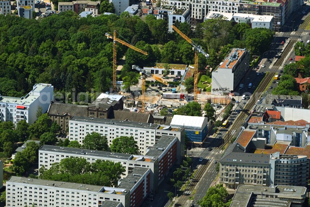 Berlin from above - Construction site to build a new office and commercial building on the site of the former UCI film theater and cinema building on Landsberger Allee in the district Friedrichshain in Berlin, Germany