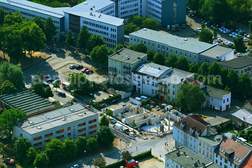 Aerial photograph Oranienburg - Construction site to build a new office and commercial building on street Havelstrasse in Oranienburg in the state Brandenburg, Germany