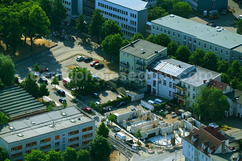 Oranienburg from above - Construction site to build a new office and commercial building on street Havelstrasse in Oranienburg in the state Brandenburg, Germany