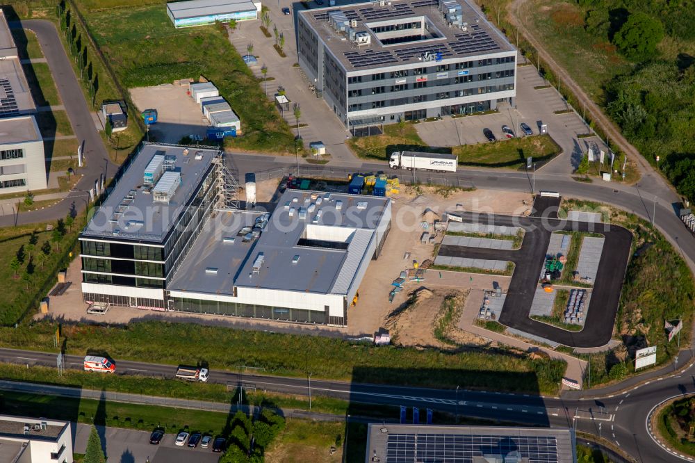 Rülzheim from the bird's eye view: Construction site to build a new office and commercial building Kardex Software GmbH on street Carl-Benz-Strasse in Ruelzheim in the state Rhineland-Palatinate, Germany