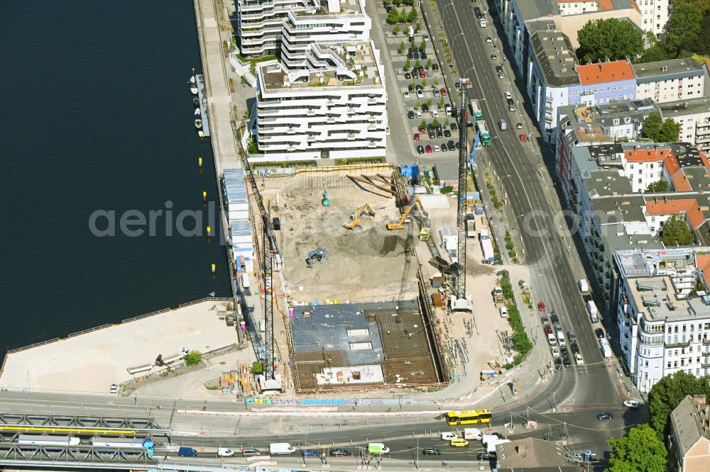 Berlin from above - Construction site to build a new office and commercial building on Mediaspree-Ostufer in Berlin, Germany