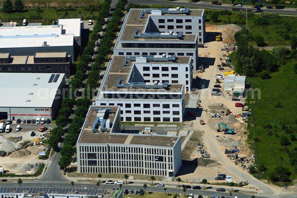Aerial photograph Schönefeld - Construction site to build a new office and commercial building on Mizarstrasse in Schoenefeld in the state Brandenburg, Germany