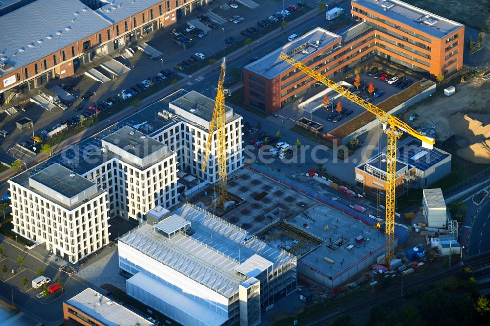 Bremen from above - Construction site to build a new office and commercial building Office Center Ueberseestadt on street Konsul-Smidt-Strasse in the district Walle in Bremen, Germany