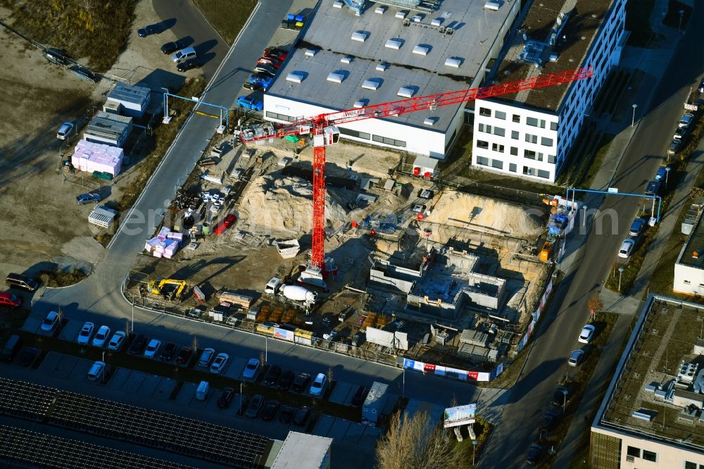 Aerial photograph Berlin - Construction site to build a new office and commercial building Am Oktogon on Hermann-Dorner-Allee in the district Adlershof in Berlin, Germany