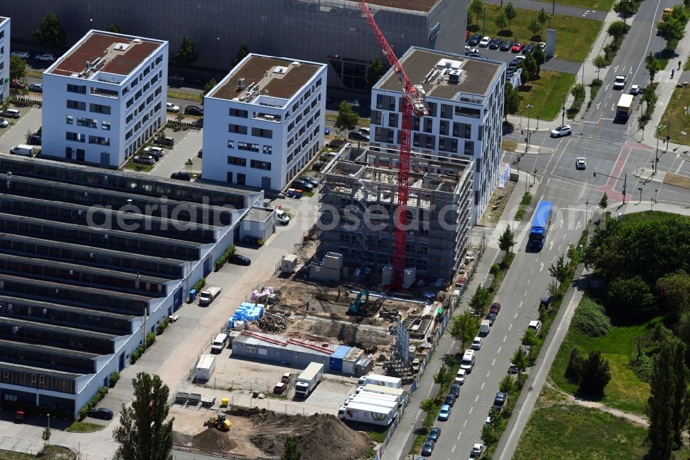Berlin from above - New construction of an office and commercial building Am Oktogon at the Rudower Chaussee in the district Adlershof in Berlin, Germany