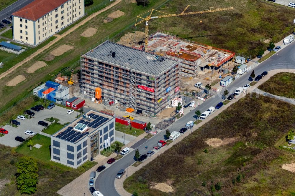 Würzburg from the bird's eye view: Construction site to build a new office and commercial building on John-Skilton-Strasse in the district Frauenland in Wuerzburg in the state Bavaria, Germany