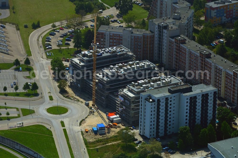 Aerial image Rostock - Construction site to build a new office and commercial building on Bahnhofsvorplatz in the district Suedstadt in Rostock in the state Mecklenburg - Western Pomerania, Germany